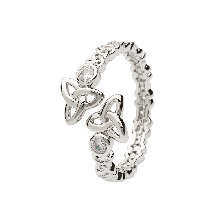 A silver ring with a celtic knot design on it.