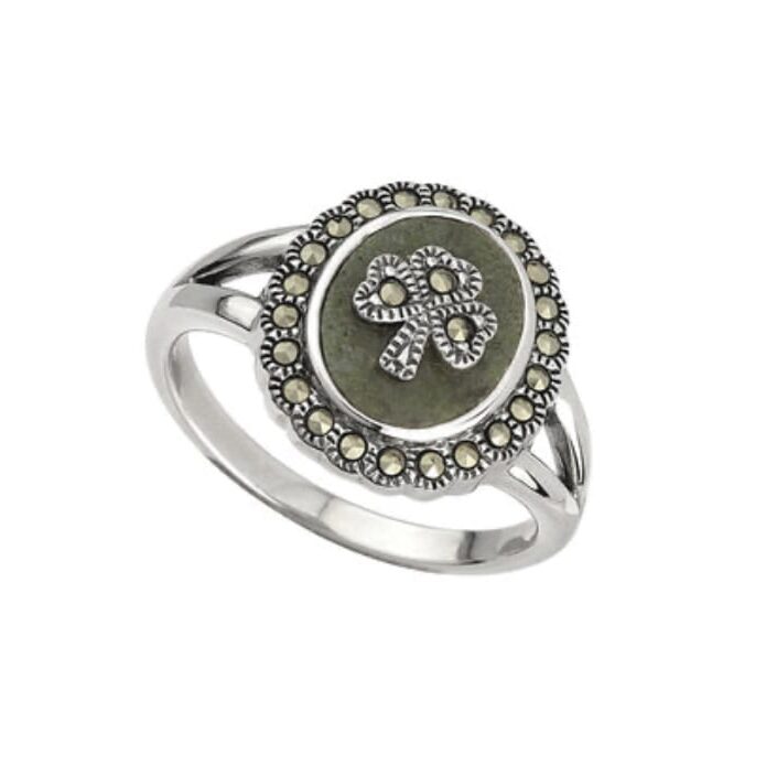 A silver ring with a green stone and marcasite.